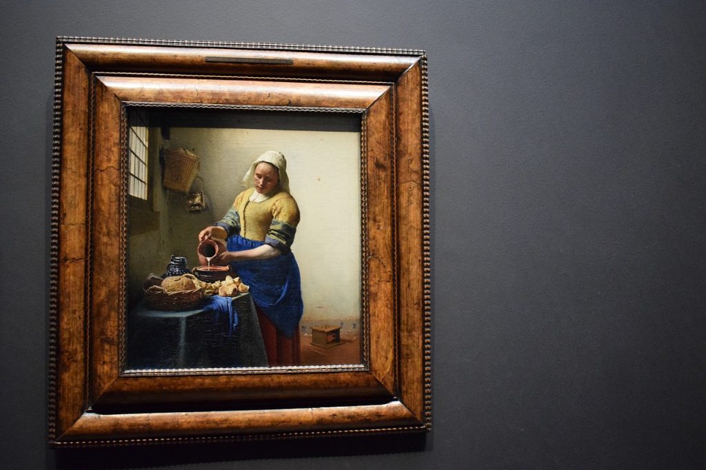 Imagem pintura the Milkmaid que veremos durante a nossa visita guiada ao Rijksmuseum
